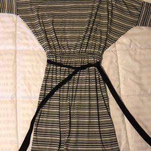 Black and white striped knee length dress.